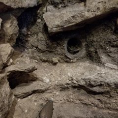Pipe opening inside of an excavation unit