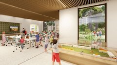 Rendering of classroom with a child at a Lego model by the window and others seated at tables