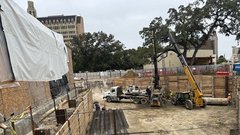 Construction crane and materials outside the future education center