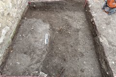 Inside of an excavation unit showing modern landscaping fill