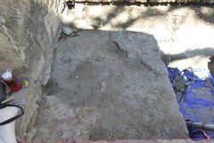 Concrete sidewalk inside of an excavation unit