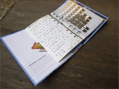 Book open to a page showing soil color chart
