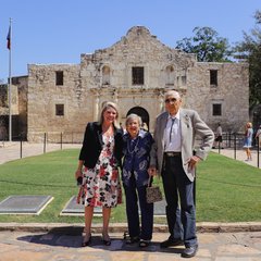Kate Rogers, Louise Yena, and Donald Yena in front of Alamo Church