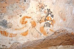 Close-up of mission-era painting inside the Alamo Church.