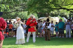 Living historians demonstrating how to fire a musket