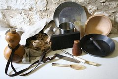 Replica food-related objects from an Alamo history trunk.