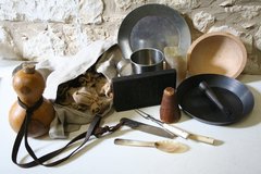 Replica food-related objects from an Alamo history trunk.