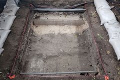 Dirt excavation area with pipes