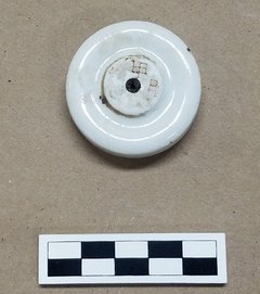 Fragment of a porcelain insulator