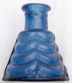 Triangle shaped blue inkwell with a cylindrical top