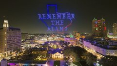 Texas Shape with words Remember the Alamo in drone lights over Alamo Church at night