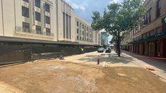 Alamo Promenade area with dirt paving to allow temporary vehicular access
