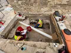Archaeologists Working In Excavation Unit archaeologists working in unit