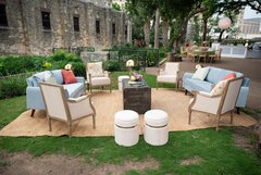 Blue and cream lounge chairs set out in an outdoor garden area