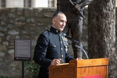 Marine General speaking at the podium during his ceremony