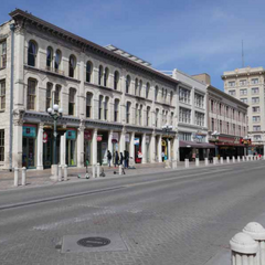 The Crockett Block, Palace Theater Arcade, and Woolworth Building.