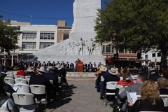 SRT members in front of the cenotaph for a ceremony