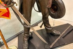 Detail of sword held by bronze statue of Lt. Colonel William Barret Travis