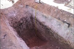 Dug out trench facing east in an excavation area
