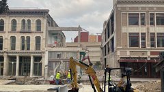 Demolished Palace Theater building next to Crockett and Woolworth buildings