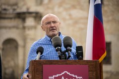 Singer Phil Collins speaking at the Alamo