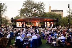 Plaza de Valero pavilion stage with audience seated at round tables