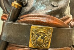 Detail of belt on bronze statue of Lt. Colonel William Barret Travis
