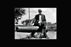 Fernando Raven seated on the 18-pounder in the 1890s