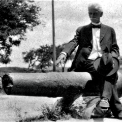 Fernando Raven seated on the 18-pounder in the 1890s