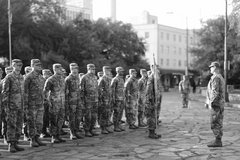 Army members standing on Alamo Plaza