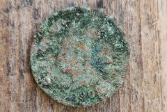 Green round penny weathered after 100+ years in the ground