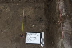 Inside of excavation unit with tape measure to show width