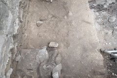 Excavation unit with limestone blocks