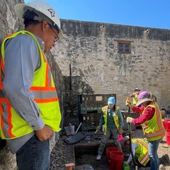 Archaeology workers in north exterior of Alamo Church