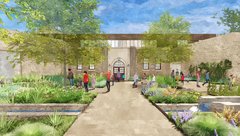 Outside of a building surrounded by gardens