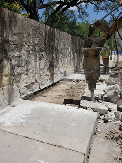 Concrete sidewalk removal along Bonham Street