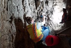 Contractor conducting preservation work to wall of Long Barrack