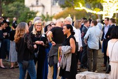 Group of guests enjoying an event in Alamo Gardens