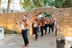 Mariachis leading the way inside Cavalry Courtyard