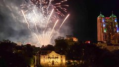 View of Alamo Church at night with fireworks in the background