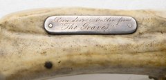 Knife handle with words noting Reindeer Antler from The Graves