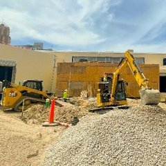 Construction truck outside of education center building