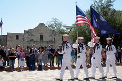 Navy Honor Guard presents the colors in front of Alamo Church