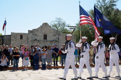 Navy Honor Guard presents the colors in front of Alamo Church