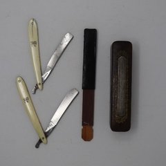 Shaving kit with two razors and a small sharpening strop