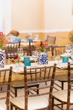 Table set up with colorful flowers and place settings in Alamo Hall