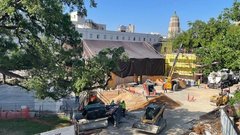 Tarp around building in construction area