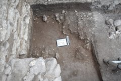 rock wall border around an excavation unit