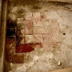 Floor tiles revealing variation in color