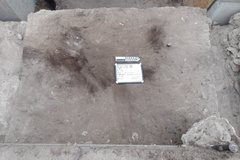 Square rocky surface in an excavation unit